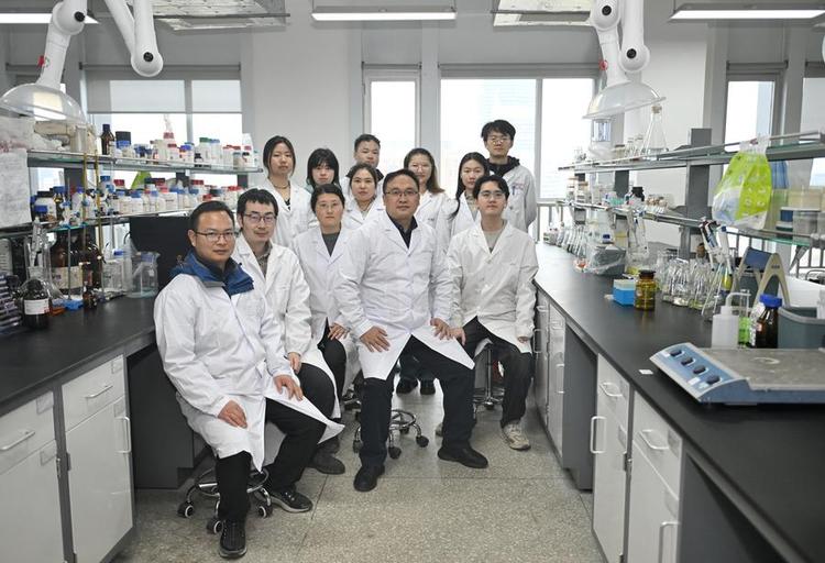 Researchers of an innovation team specializing in synthetic microbiomes and wastewater resource utilization of the Chengdu Institute of Biology, Chinese Academy of Sciences, pose for a group photo at a laboratory in Chengdu, southwest China's Sichuan Province, March 18, 2025. (Xinhua/Liu Kun)